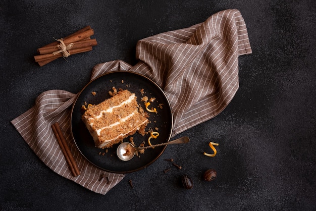 A slice of delicious homeade cake with walnus and cinnamon