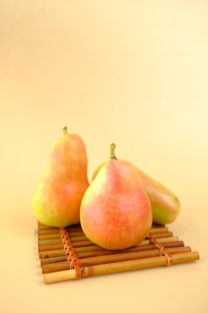 Slice of fresh pears on table close up