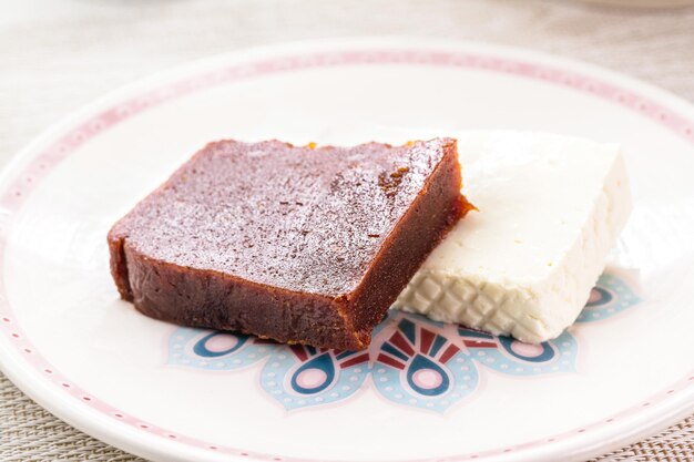 Slice of guava jam with slice of Minas cheese a traditional dessert from Brazil known as Romeo and Juliet