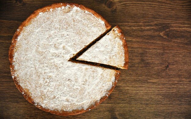 Slice of homemade pie with lemon and orange filling