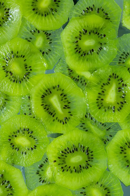 Photo slice of kiwi fruit on a full frame