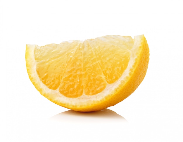 Slice of lemon fruit isolated on white space