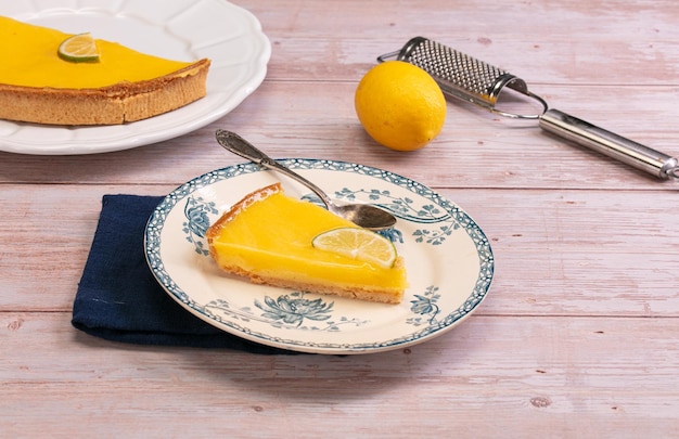 Slice of lemon pie on an old plate