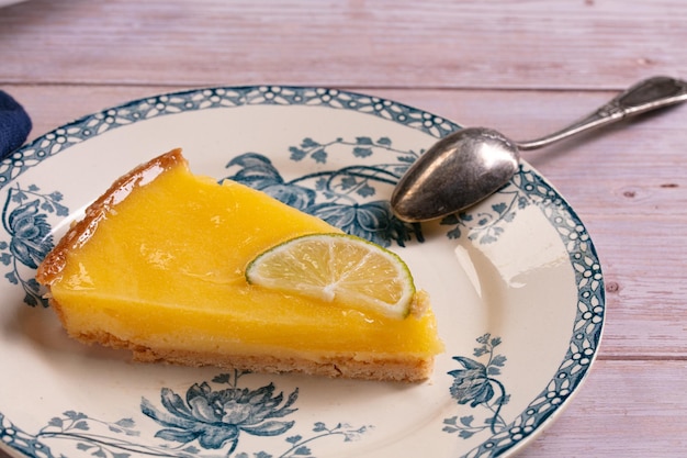 Slice of lemon pie on an old plate