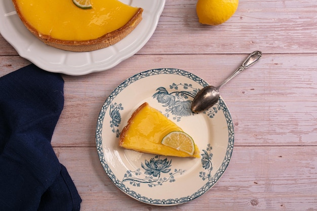 Slice of lemon pie on an old plate