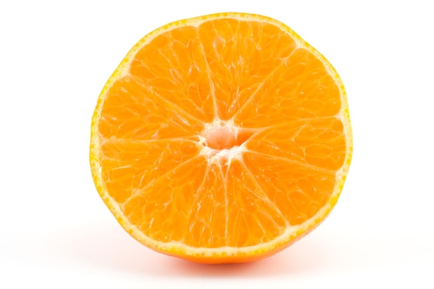 A slice of mandarin or tangerine on a white background