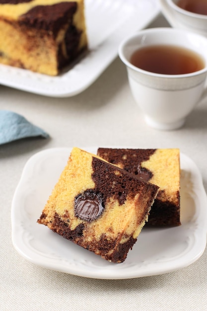 Slice of Marble Travel Cake Square Cake with Melted Chocolate on the Center