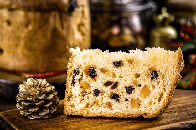 Slice of panettone, homemade baked bread with candied fruit, traditional for Christmas in Brazil and Italy.