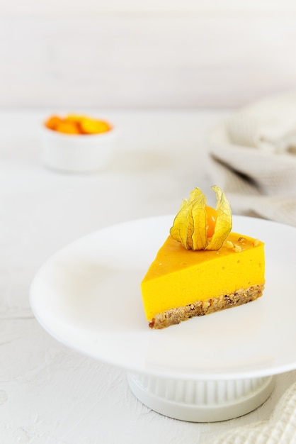 Slice of pumpkin cake on a white plate