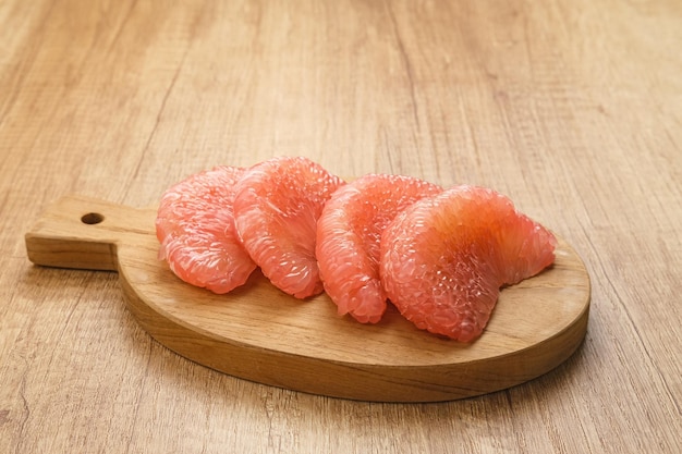 Slice of Red Pomelo citrus fruit or Jeruk Bali