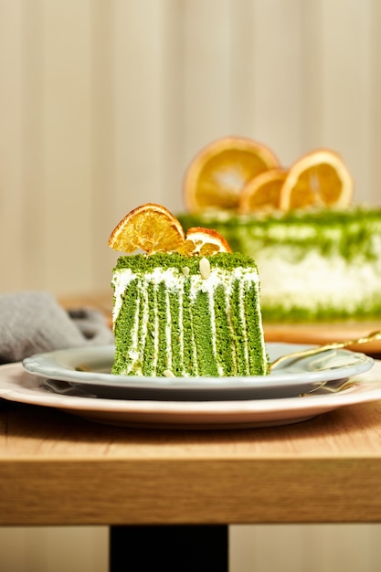 Slice of spinach cake on plate