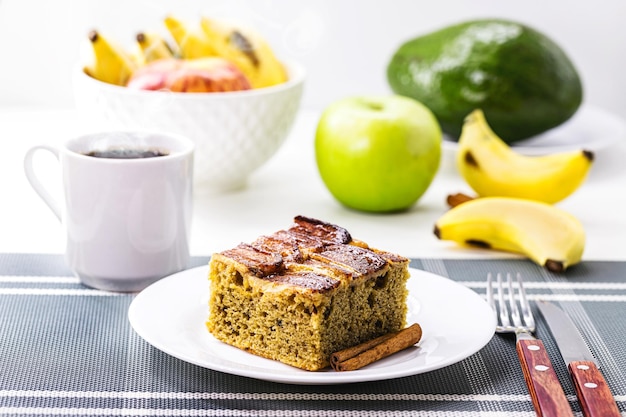 Slice of vegan banana cake organic typical bakery cake in Brazil made with cinnamon and fruits