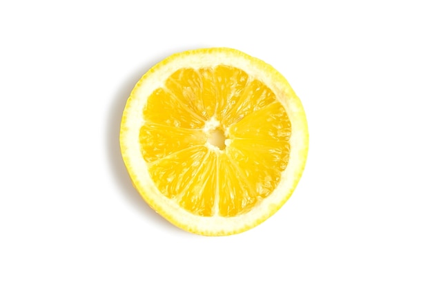 Slice of yellow fresh lemon isolated on white. Tasty and healthy food