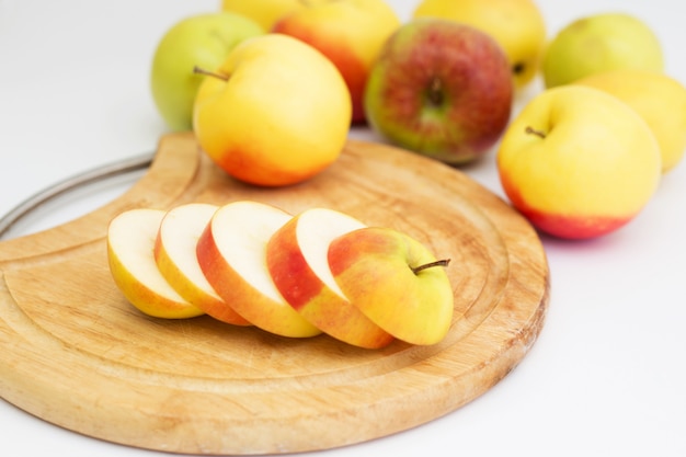 Sliced apple on a wooden board