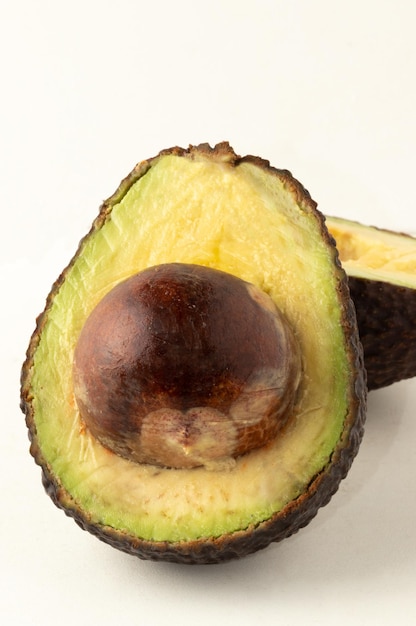 Sliced avocado on white background