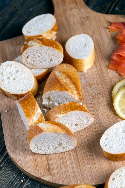 Sliced baguette while cooking in the kitchen