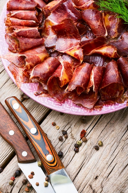 Sliced basturma or meat jerky.Beef jerky,dried beef on plate.Armenian food