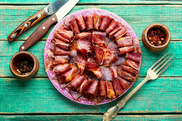 Sliced basturma or meat jerky.Beef jerky,dried beef on plate.Armenian food