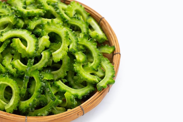 Sliced bitter gourd on white background