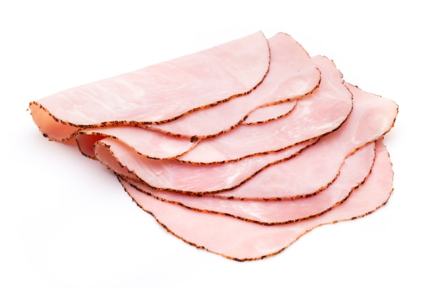 Sliced boiled ham sausage isolated on white, top view.