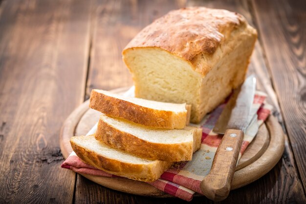 Sliced bread with butter closeup