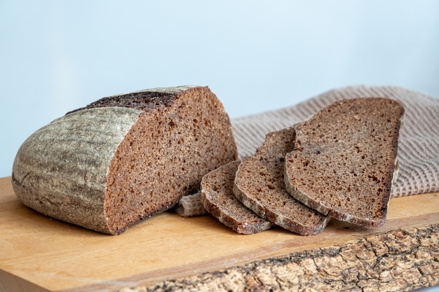 Sliced bread with sunflower seeds and sesame on a plate