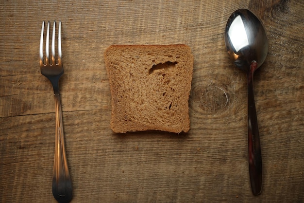 Sliced bread on a wooden background