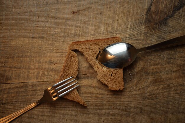 Sliced bread on a wooden background