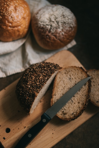 Sliced bun on wooden board