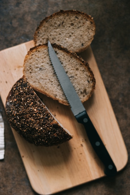 Sliced bun on wooden board