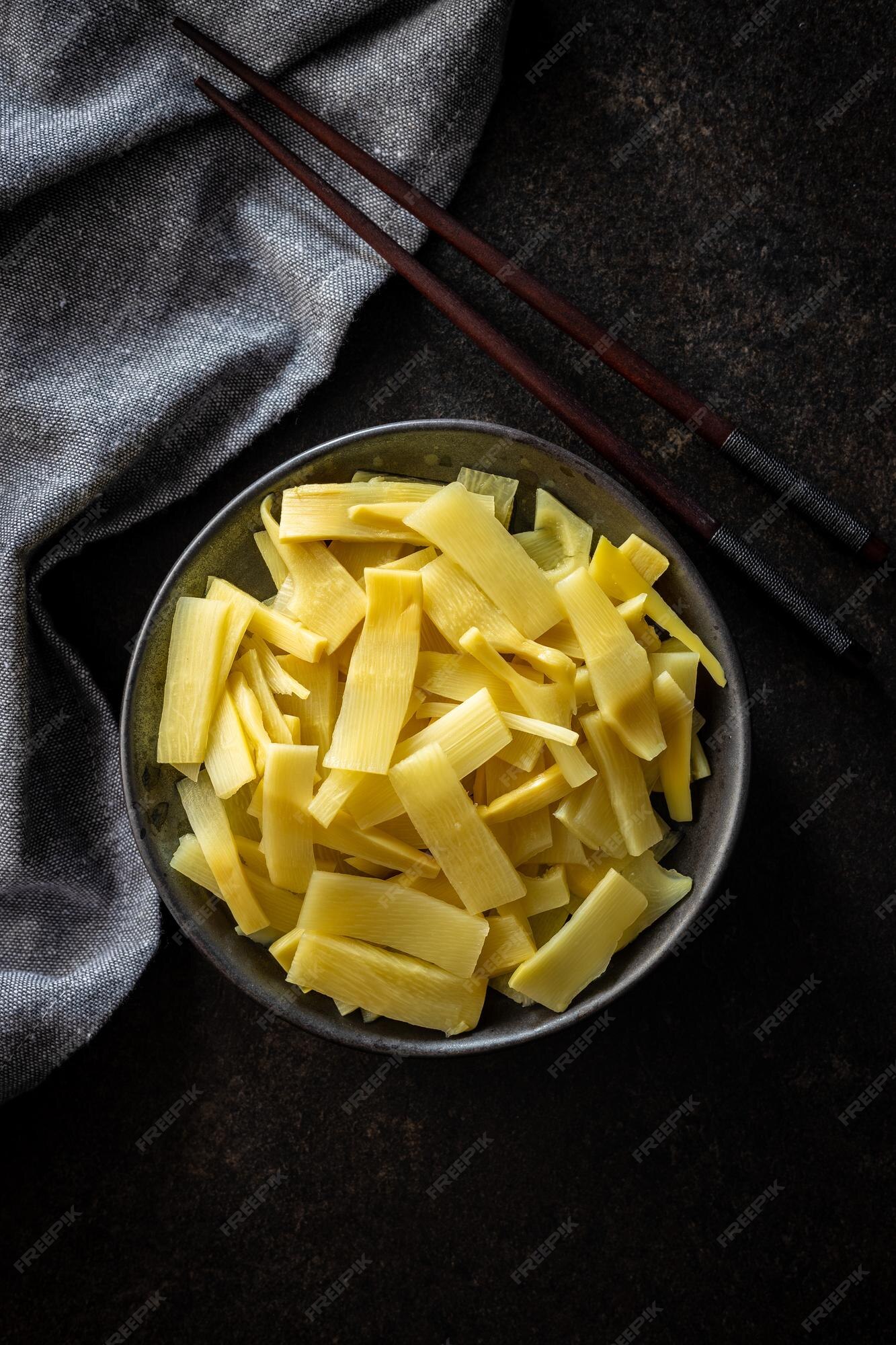Premium Photo Sliced canned bamboo shoots on plate