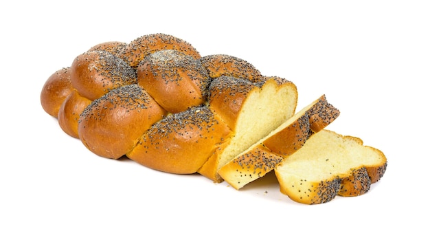 Sliced challah bread on white background
