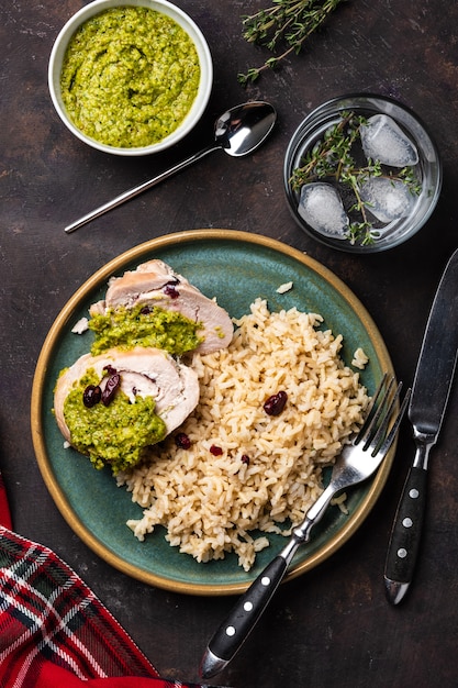 Sliced Chicken Roll with Cranberries, Pesto and Rice.