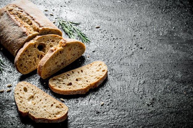 Sliced ciabatta bread with rosemary