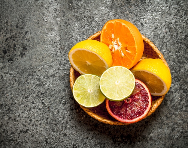 Sliced citrus fruits in a basket.