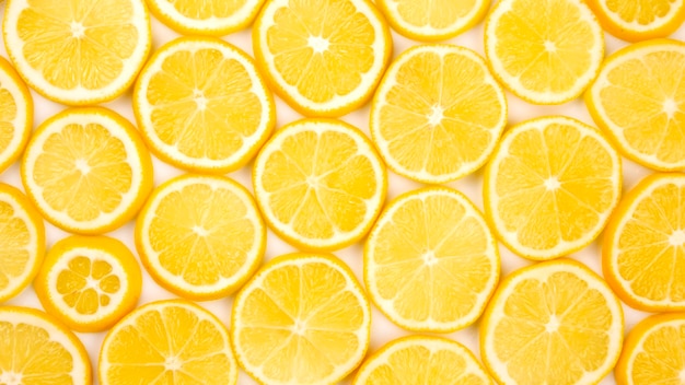 sliced citrus lemons half on a light background