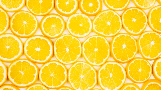 Sliced citrus lemons half on a light