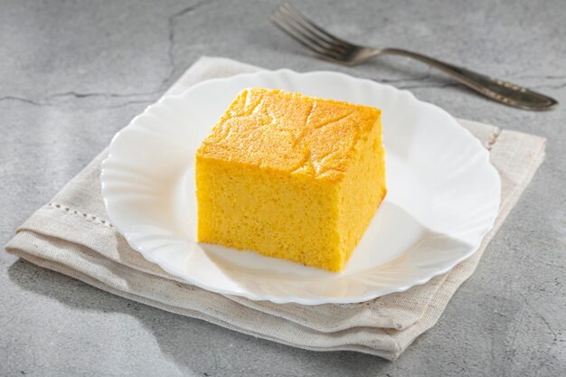 Sliced cornmeal cake on the table