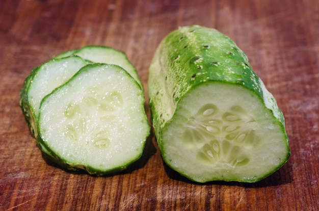 Sliced cucumber on a wooden table