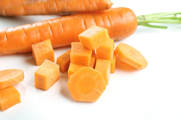 Sliced and diced carrot isolated on white