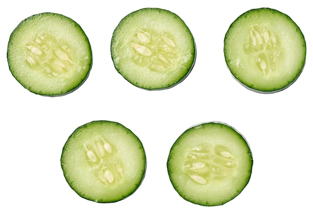 Sliced fresh cucumber on a white background top view