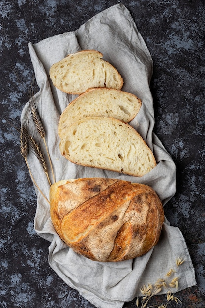 Sliced fresh homemade sourdough bread in a rustic style