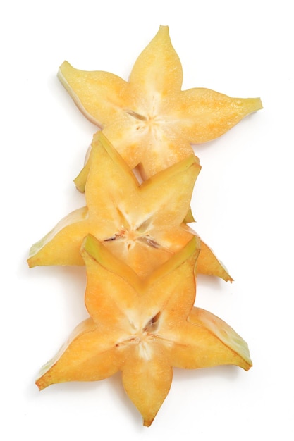 Sliced fresh organic star fruit delicious top view isolated on white background clipping path