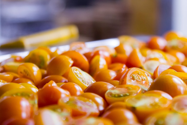 Sliced fresh red tomatoes on a table