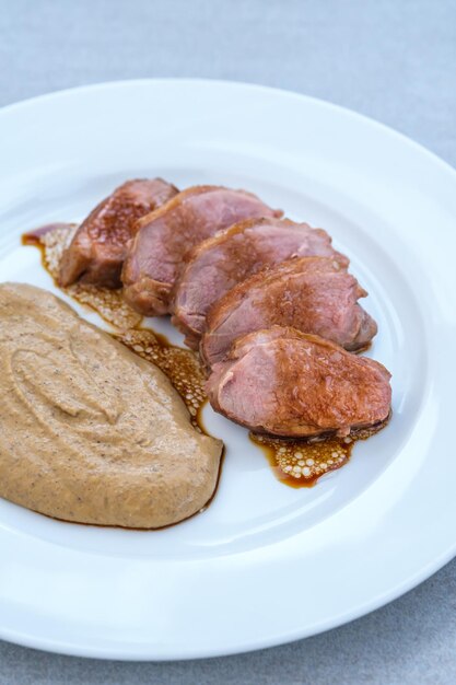 Sliced fried duck breast