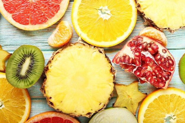 Sliced fruits on table closeup