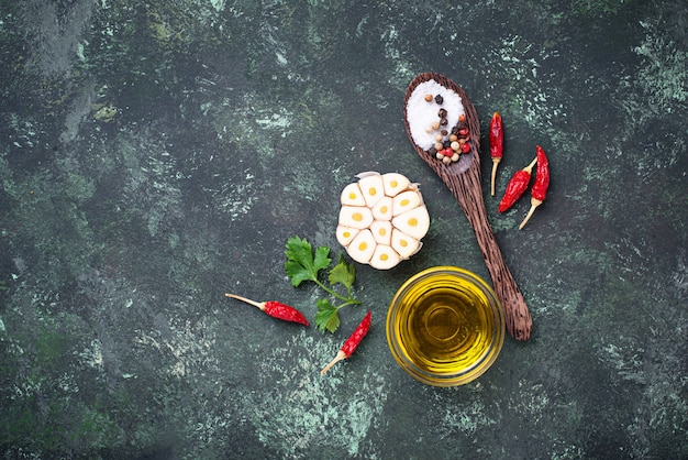 Sliced garlic, red pepper, parsley and oil.