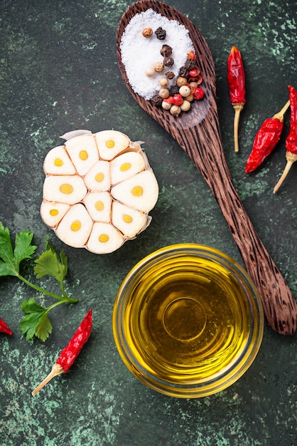 Sliced garlic, red pepper, parsley and oil.