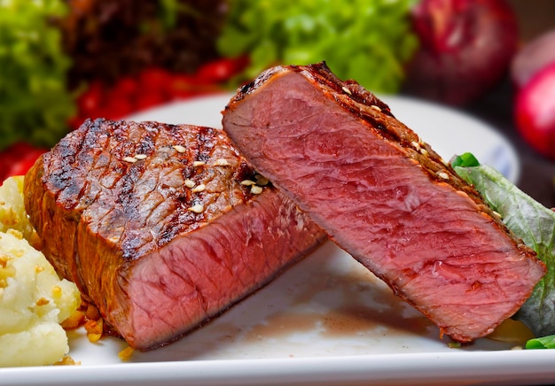Sliced grilled steak served