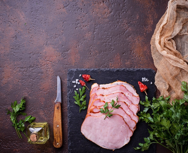 Sliced ham with spices. 